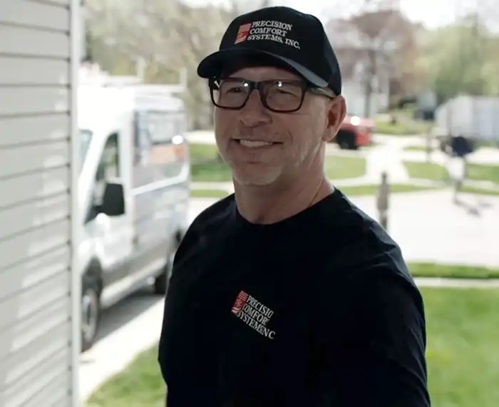TechnicianAtDoor Service Technician at door in Carmel Indiana